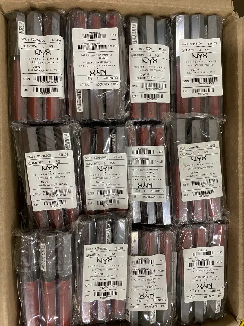 Box of NYX Professional Makeup lip products in individual retail packaging