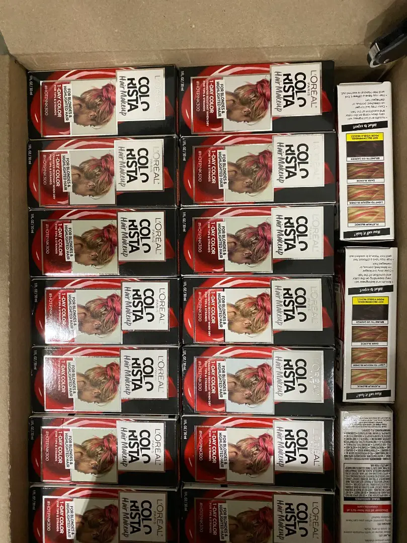 Case of L'Oreal Colorista hair makeup units from a shelf-pull cosmetics load